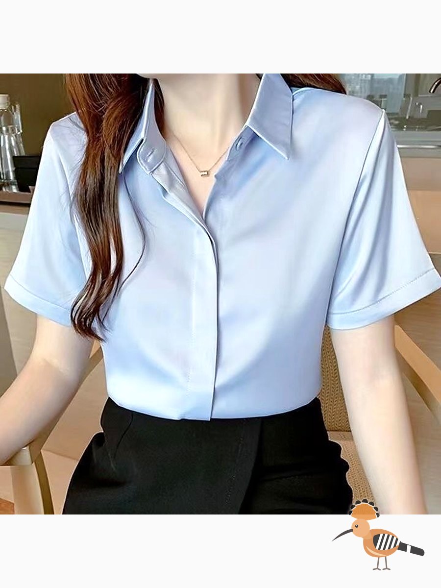 بلوزة بيضاء طويلة بلا أزرار للعمل